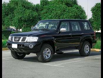 Nissan  Patrol  Safari  2024  Manual  0 Km  6 Cylinder  Four Wheel Drive (4WD)  SUV  Black  With Warranty