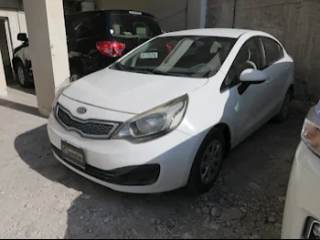 Kia  Rio  2014  Automatic  178,000 Km  4 Cylinder  Front Wheel Drive (FWD)  Sedan  White