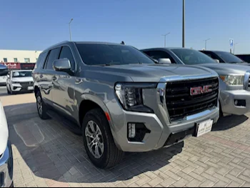 GMC  Yukon  SLE  2023  Automatic  26,000 Km  8 Cylinder  Rear Wheel Drive (RWD)  SUV  Gray  With Warranty