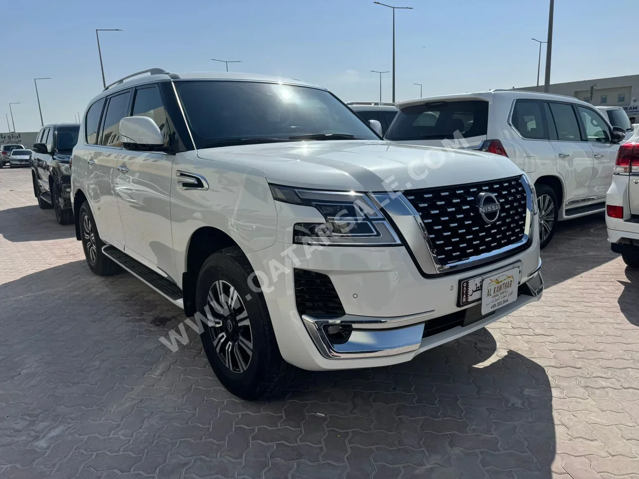 Nissan  Patrol  Titanium  2023  Automatic  14,000 Km  6 Cylinder  Four Wheel Drive (4WD)  SUV  White  With Warranty