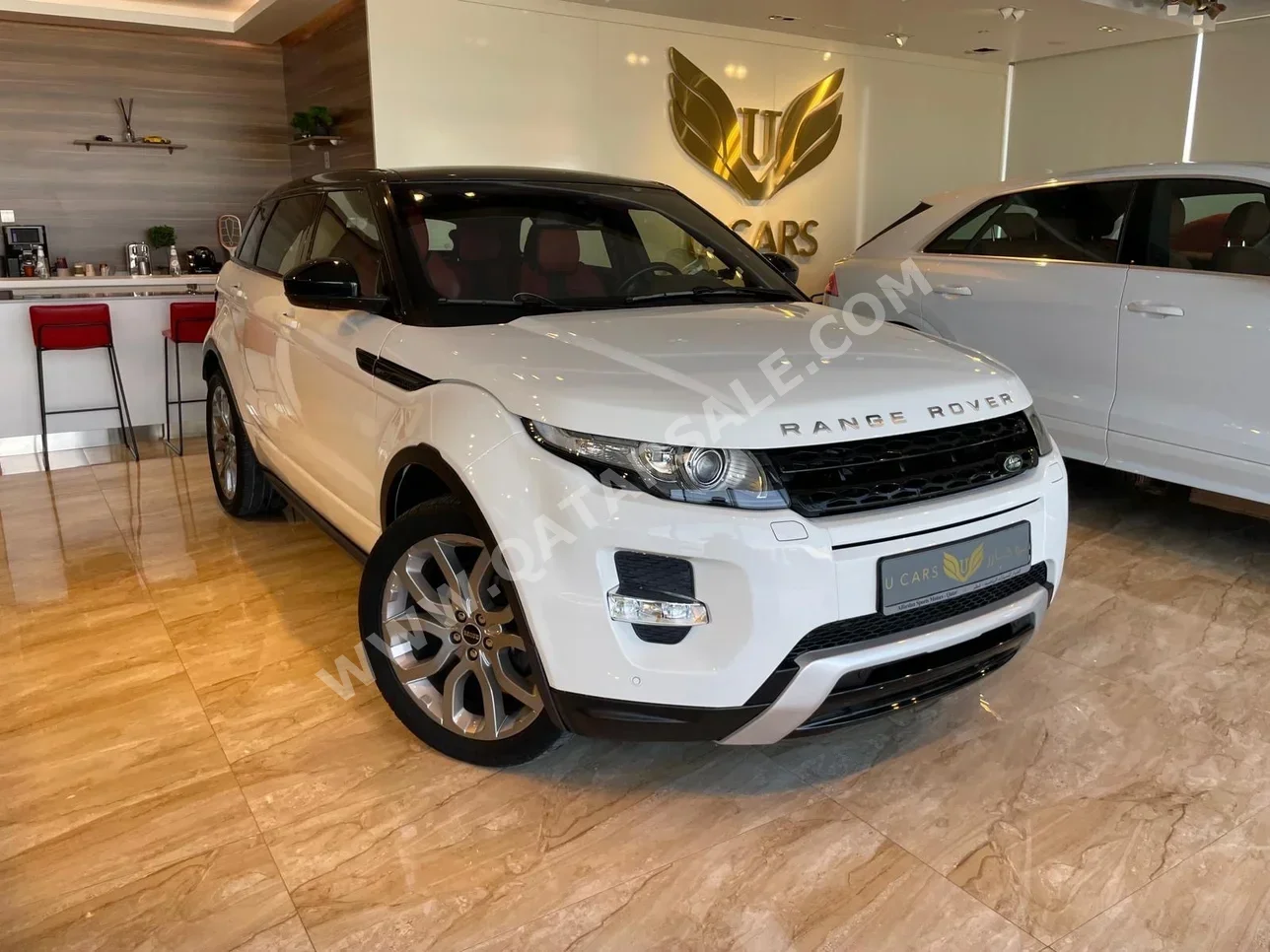 Land Rover  Evoque  2015  Automatic  116,000 Km  4 Cylinder  Four Wheel Drive (4WD)  SUV  White