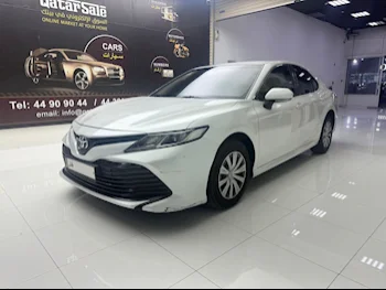 Toyota  Camry  LE  2018  Automatic  203,000 Km  4 Cylinder  Front Wheel Drive (FWD)  Sedan  White