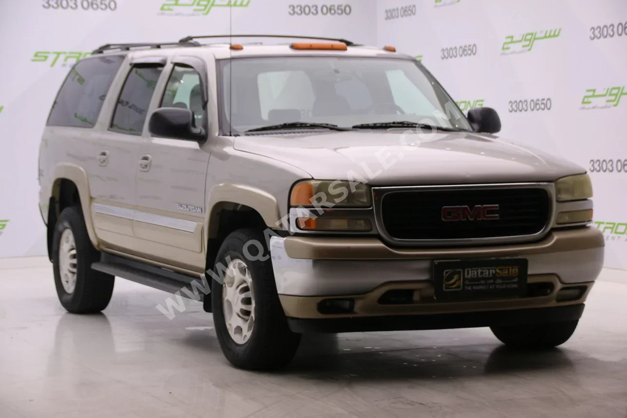 GMC  Suburban  2005  Automatic  242,000 Km  8 Cylinder  Four Wheel Drive (4WD)  SUV  Silver