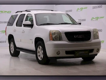 GMC  Yukon  2011  Automatic  215,000 Km  8 Cylinder  Four Wheel Drive (4WD)  SUV  White