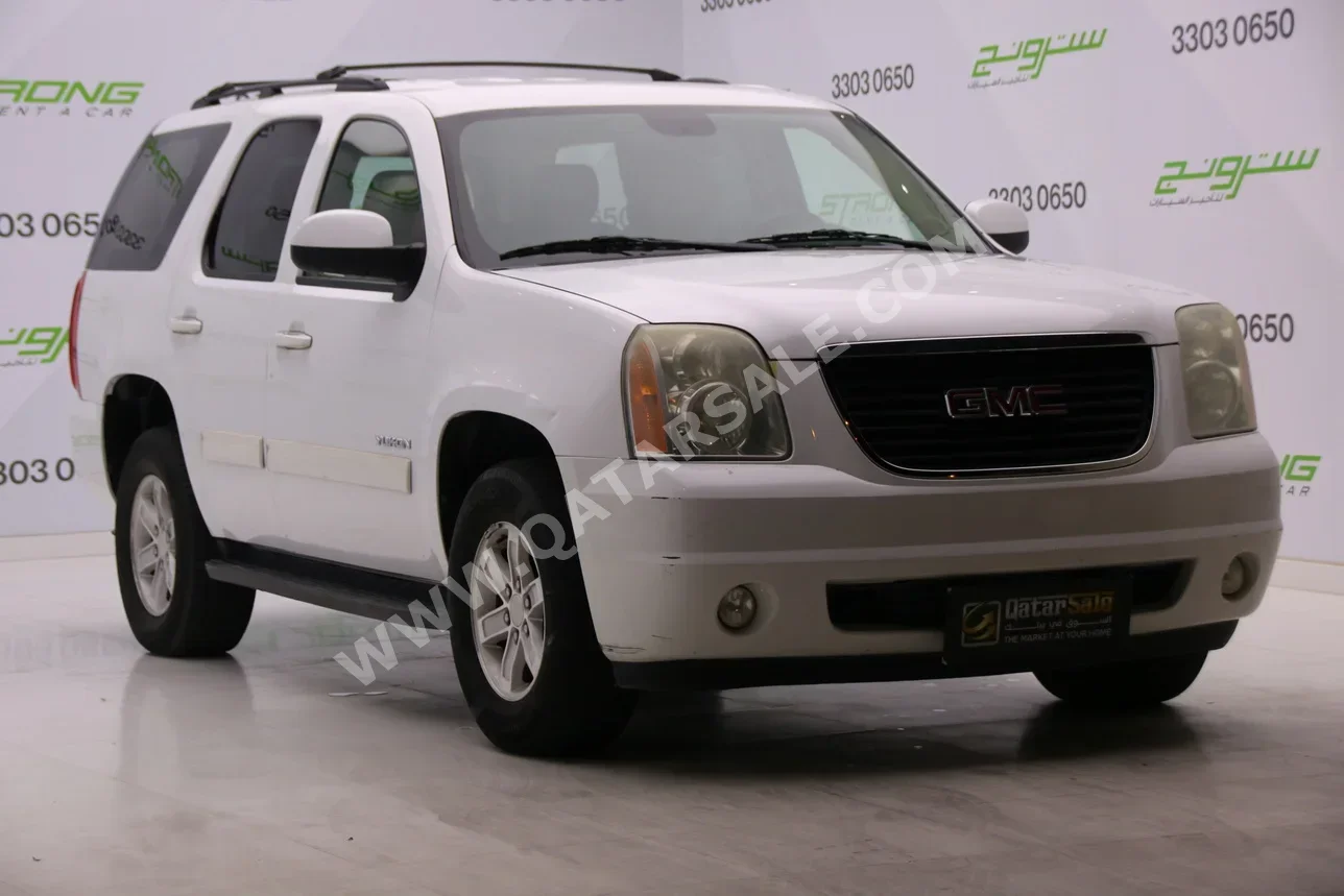 GMC  Yukon  2011  Automatic  215,000 Km  8 Cylinder  Four Wheel Drive (4WD)  SUV  White