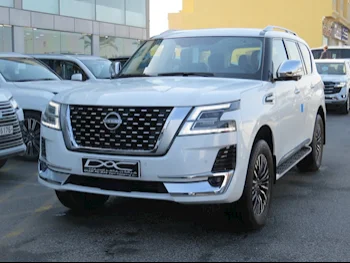 Nissan  Patrol  Platinum  2023  Automatic  0 Km  6 Cylinder  Four Wheel Drive (4WD)  SUV  White  With Warranty