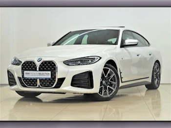 BMW  4-Series  420 I  2024  Automatic  8,700 Km  4 Cylinder  Rear Wheel Drive (RWD)  Sedan  White  With Warranty