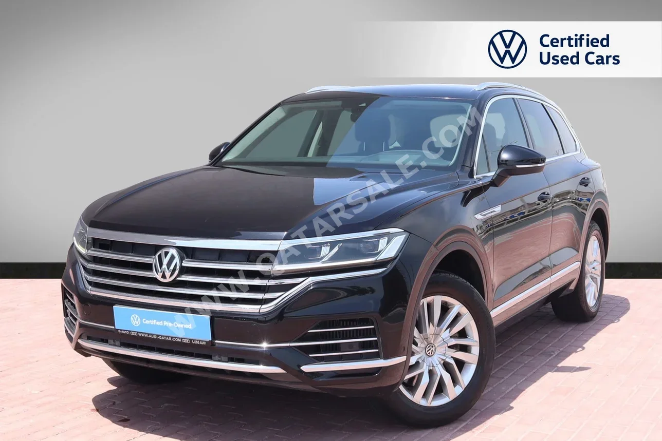 Volkswagen  Touareg  Comfort Line  2018  Automatic  95,600 Km  6 Cylinder  All Wheel Drive (AWD)  SUV  Black