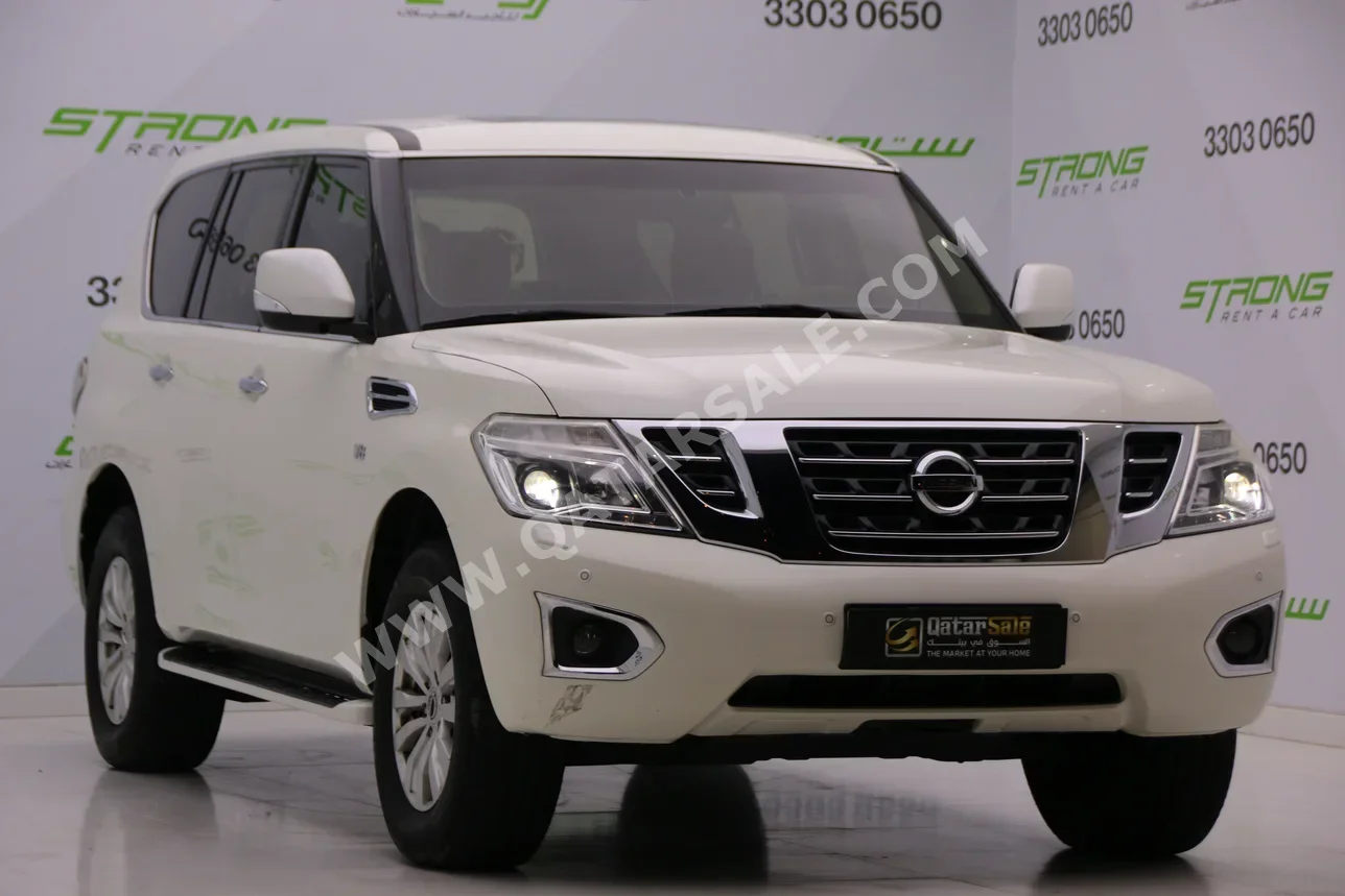 Nissan  Patrol  SE  2016  Automatic  119,500 Km  8 Cylinder  Four Wheel Drive (4WD)  SUV  White