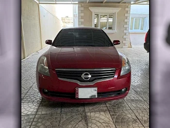 Nissan  Altima  2.5 S  2009  Automatic  60,500 Km  4 Cylinder  Front Wheel Drive (FWD)  Sedan  Dark Red