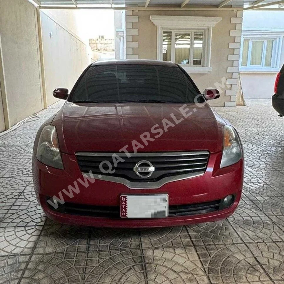 Nissan  Altima  2.5 S  2009  Automatic  60,500 Km  4 Cylinder  Front Wheel Drive (FWD)  Sedan  Dark Red