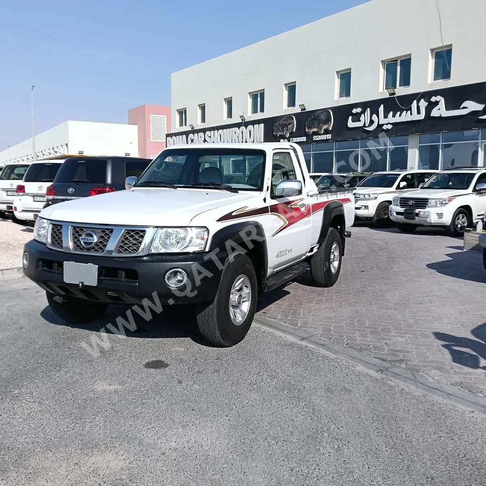 Nissan  Patrol  Pickup  2012  Manual  213,000 Km  6 Cylinder  Four Wheel Drive (4WD)  Pick Up  White