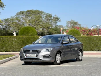 MG  5  2020  Automatic  90,450 Km  4 Cylinder  Front Wheel Drive (FWD)  Sedan  Gray