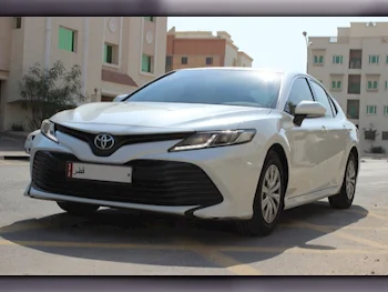 Toyota  Camry  LE  2019  Automatic  150,000 Km  4 Cylinder  Front Wheel Drive (FWD)  Sedan  White