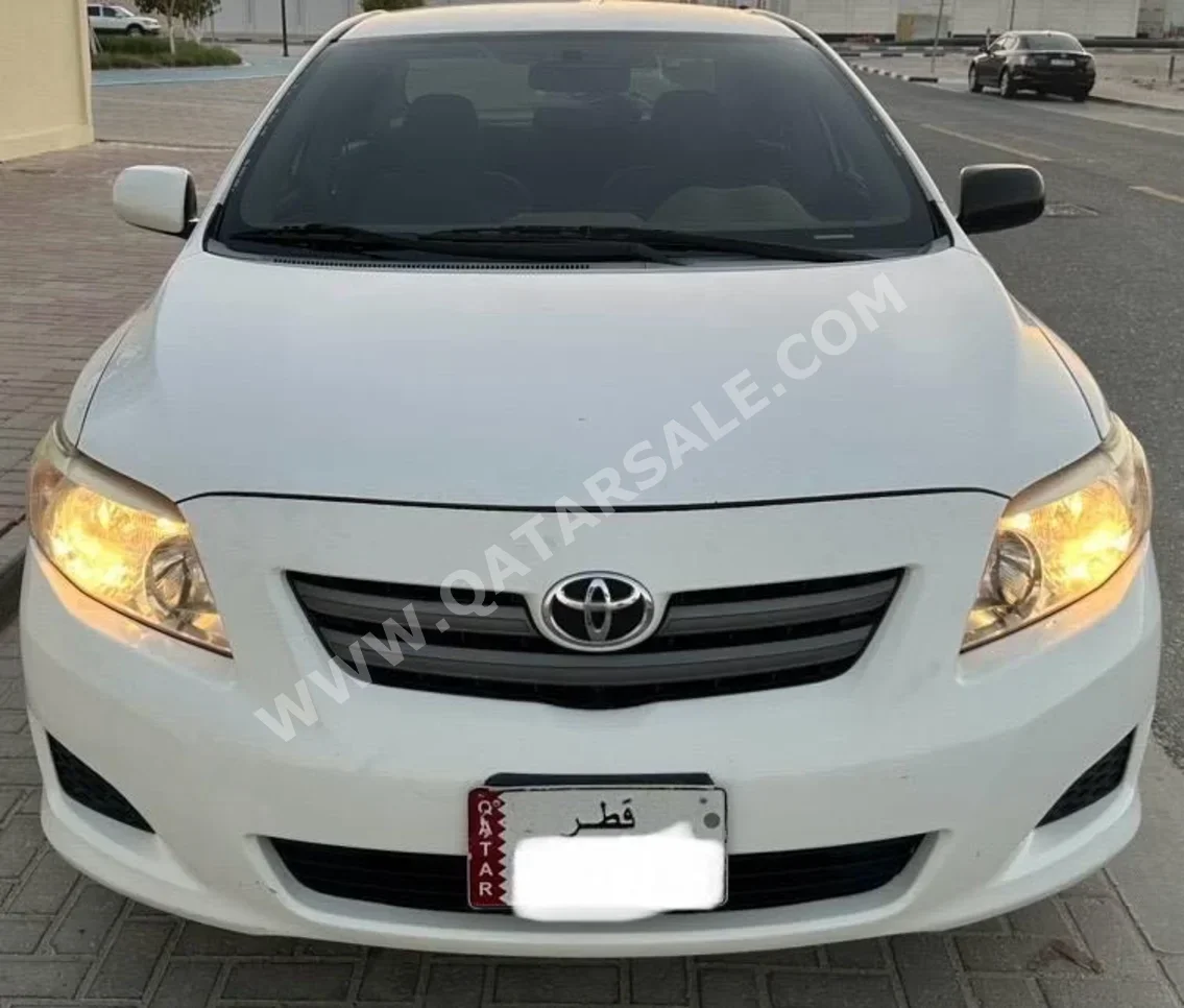 Toyota  Corolla  XLI  2010  Automatic  210,000 Km  4 Cylinder  Front Wheel Drive (FWD)  Sedan  White