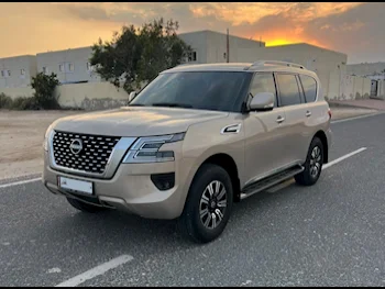  Nissan  Patrol  Titanium  2022  Automatic  13,000 Km  6 Cylinder  Four Wheel Drive (4WD)  SUV  Gold  With Warranty