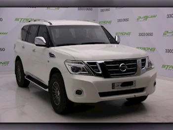 Nissan  Patrol  SE  2012  Automatic  250,000 Km  6 Cylinder  Four Wheel Drive (4WD)  SUV  White  With Warranty