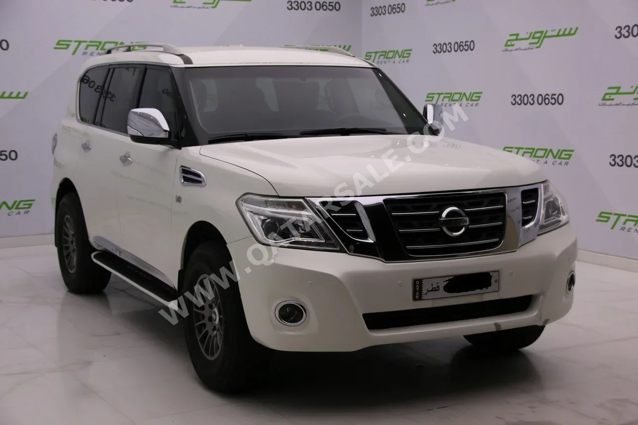 Nissan  Patrol  SE  2012  Automatic  250,000 Km  6 Cylinder  Four Wheel Drive (4WD)  SUV  White  With Warranty