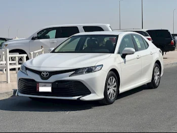 Toyota  Camry  LE  2019  Automatic  32,000 Km  4 Cylinder  Front Wheel Drive (FWD)  Sedan  White