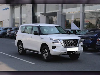 Nissan  Patrol  XE  2024  Automatic  0 Km  6 Cylinder  Four Wheel Drive (4WD)  SUV  White  With Warranty