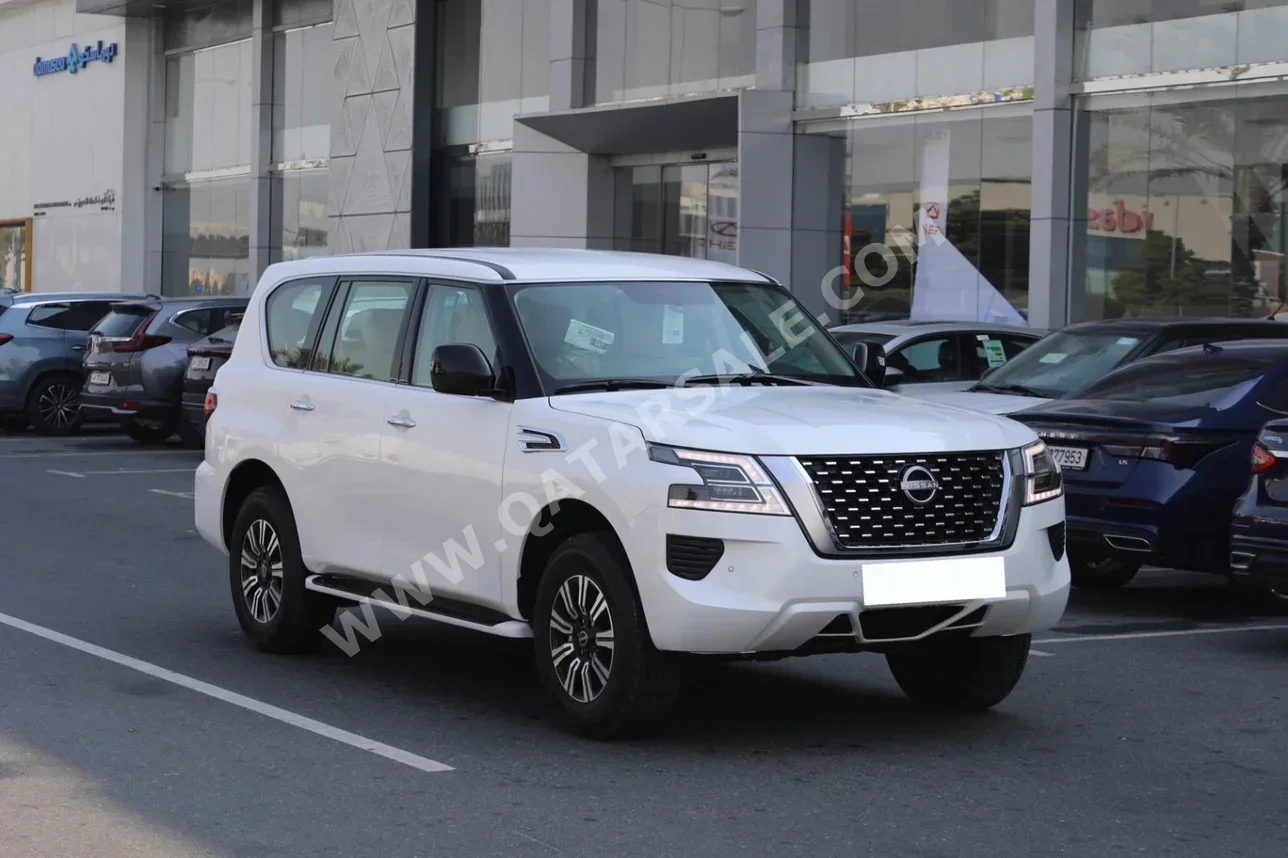 Nissan  Patrol  XE  2024  Automatic  0 Km  6 Cylinder  Four Wheel Drive (4WD)  SUV  White  With Warranty