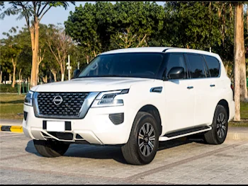 Nissan  Patrol  XE  2023  Automatic  17,458 Km  6 Cylinder  Four Wheel Drive (4WD)  SUV  White  With Warranty