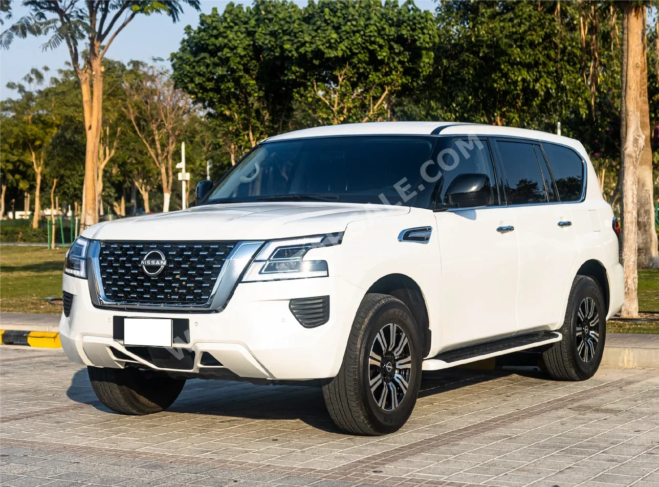 Nissan  Patrol  XE  2023  Automatic  17,458 Km  6 Cylinder  Four Wheel Drive (4WD)  SUV  White  With Warranty