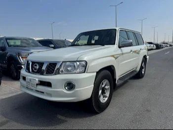 Nissan  Patrol  Super Safari  2009  Automatic  411,000 Km  6 Cylinder  Four Wheel Drive (4WD)  SUV  White