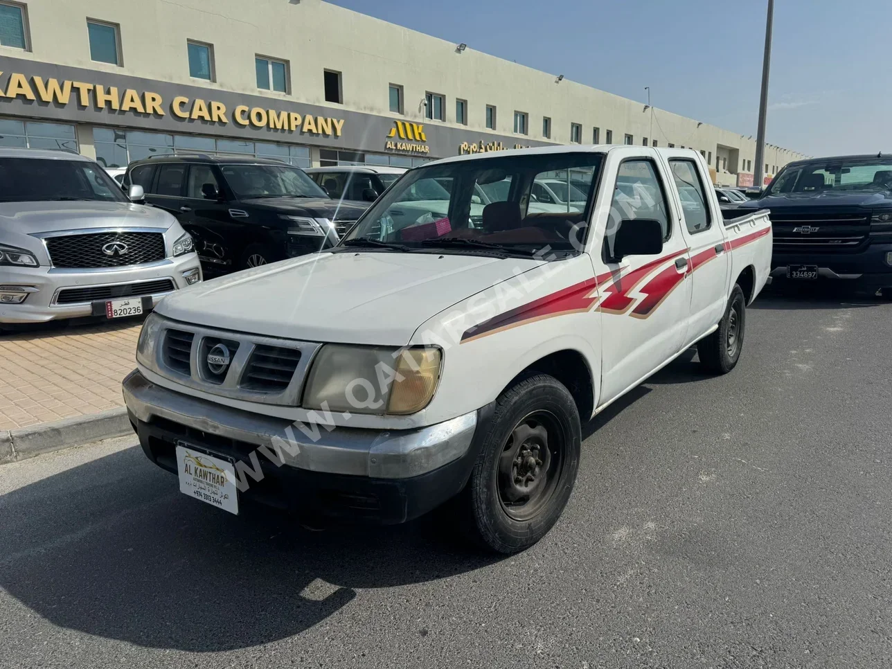 Nissan  Pickup  2001  Manual  949,000 Km  4 Cylinder  Rear Wheel Drive (RWD)  Pick Up  White