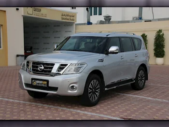  Nissan  Patrol  Platinum  2014  Automatic  215,000 Km  8 Cylinder  Four Wheel Drive (4WD)  SUV  Silver  With Warranty