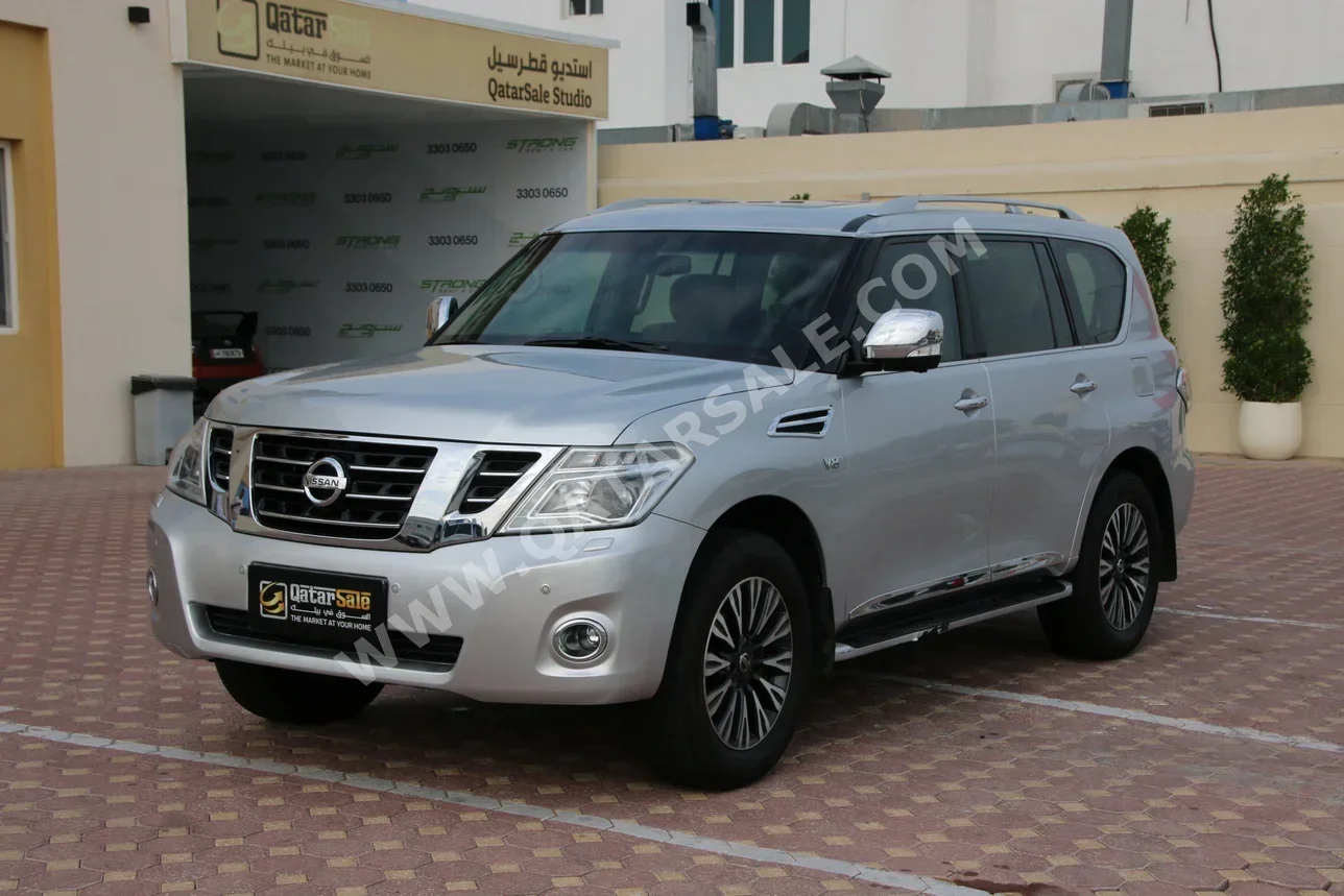  Nissan  Patrol  Platinum  2014  Automatic  215,000 Km  8 Cylinder  Four Wheel Drive (4WD)  SUV  Silver  With Warranty