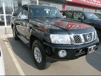 Nissan  Patrol  Safari  2019  Manual  59,000 Km  6 Cylinder  Four Wheel Drive (4WD)  SUV  Black