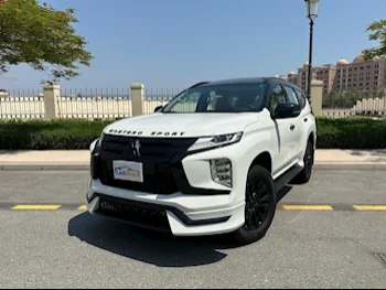 Mitsubishi  Pajero  Montero Sport  2023  Automatic  0 Km  6 Cylinder  Four Wheel Drive (4WD)  SUV  White  With Warranty