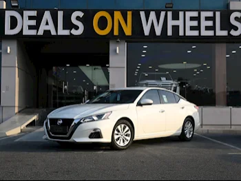 Nissan  Altima  2021  Automatic  13,000 Km  4 Cylinder  Front Wheel Drive (FWD)  Sedan  White