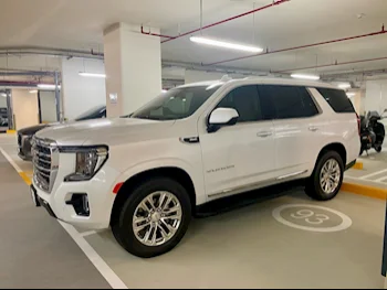 GMC  Yukon  SLT  2023  Automatic  31,500 Km  8 Cylinder  Four Wheel Drive (4WD)  SUV  White  With Warranty