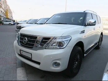 Nissan  Patrol  2012  Manual  267,000 Km  8 Cylinder  Four Wheel Drive (4WD)  SUV  White