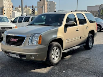 GMC  Yukon  2012  Automatic  220,000 Km  8 Cylinder  Four Wheel Drive (4WD)  SUV  Gold