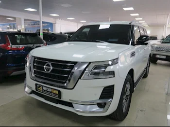 Nissan  Patrol  Platinum  2015  Automatic  212,000 Km  8 Cylinder  Four Wheel Drive (4WD)  SUV  White