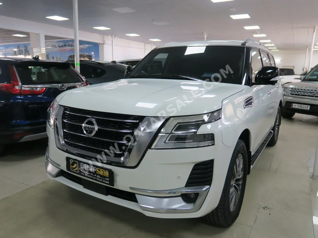 Nissan  Patrol  Platinum  2015  Automatic  212,000 Km  8 Cylinder  Four Wheel Drive (4WD)  SUV  White