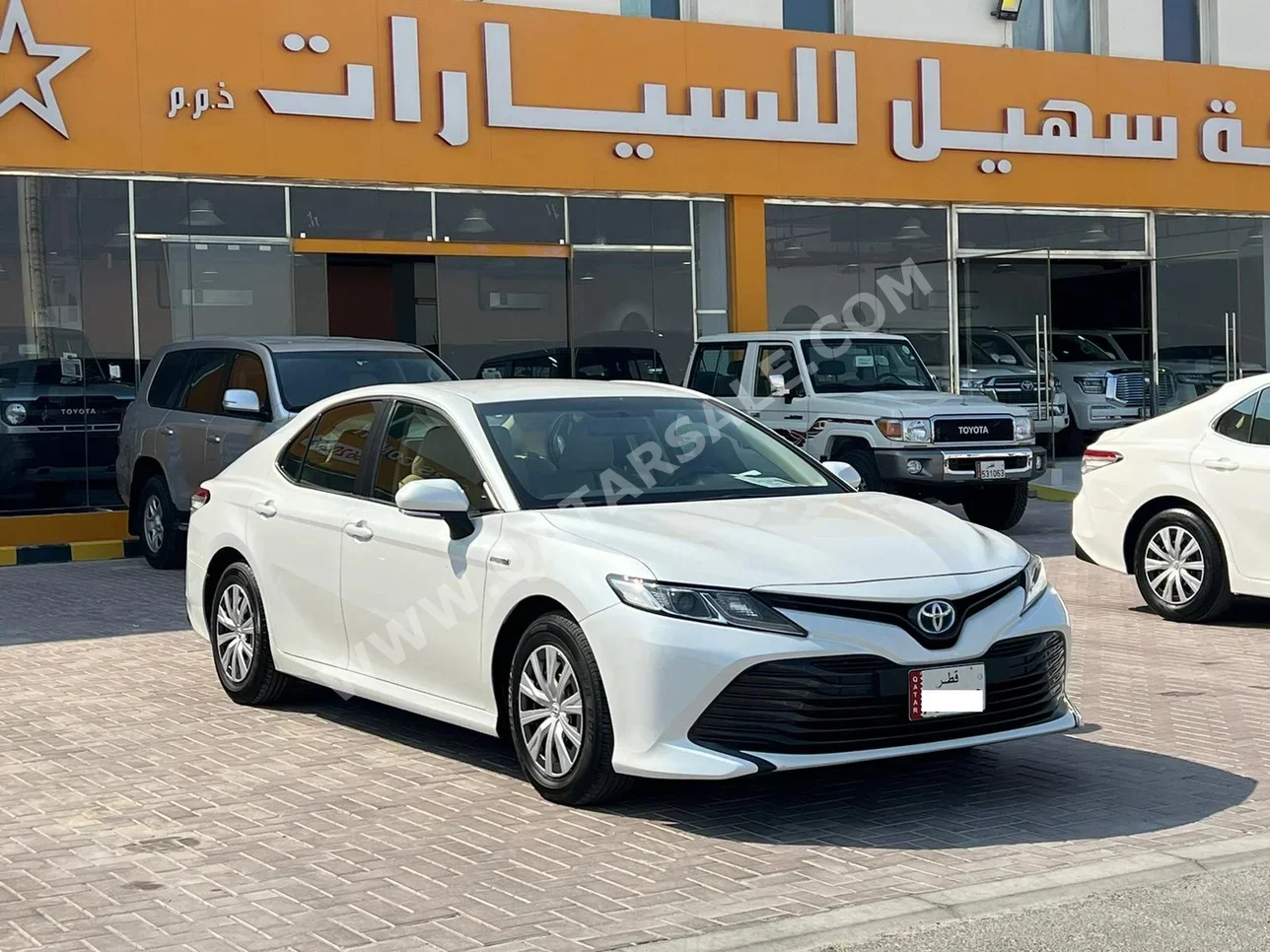 Toyota  Camry  LE  2019  Automatic  64,000 Km  4 Cylinder  Front Wheel Drive (FWD)  Sedan  White