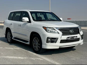 Lexus  LX  570 S  2014  Automatic  379,000 Km  8 Cylinder  Four Wheel Drive (4WD)  SUV  White