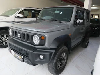 Suzuki  Jimny  2022  Automatic  17,000 Km  4 Cylinder  Four Wheel Drive (4WD)  SUV  Gray  With Warranty