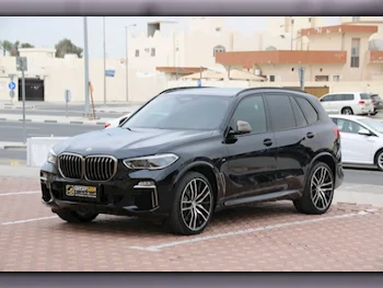 BMW  X-Series  X5 M50i  2020  Automatic  59,000 Km  8 Cylinder  Four Wheel Drive (4WD)  SUV  Black  With Warranty