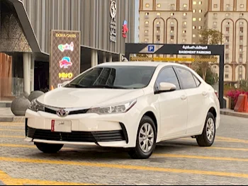 Toyota  Corolla  XLI  2018  Automatic  203,000 Km  4 Cylinder  Front Wheel Drive (FWD)  Sedan  White