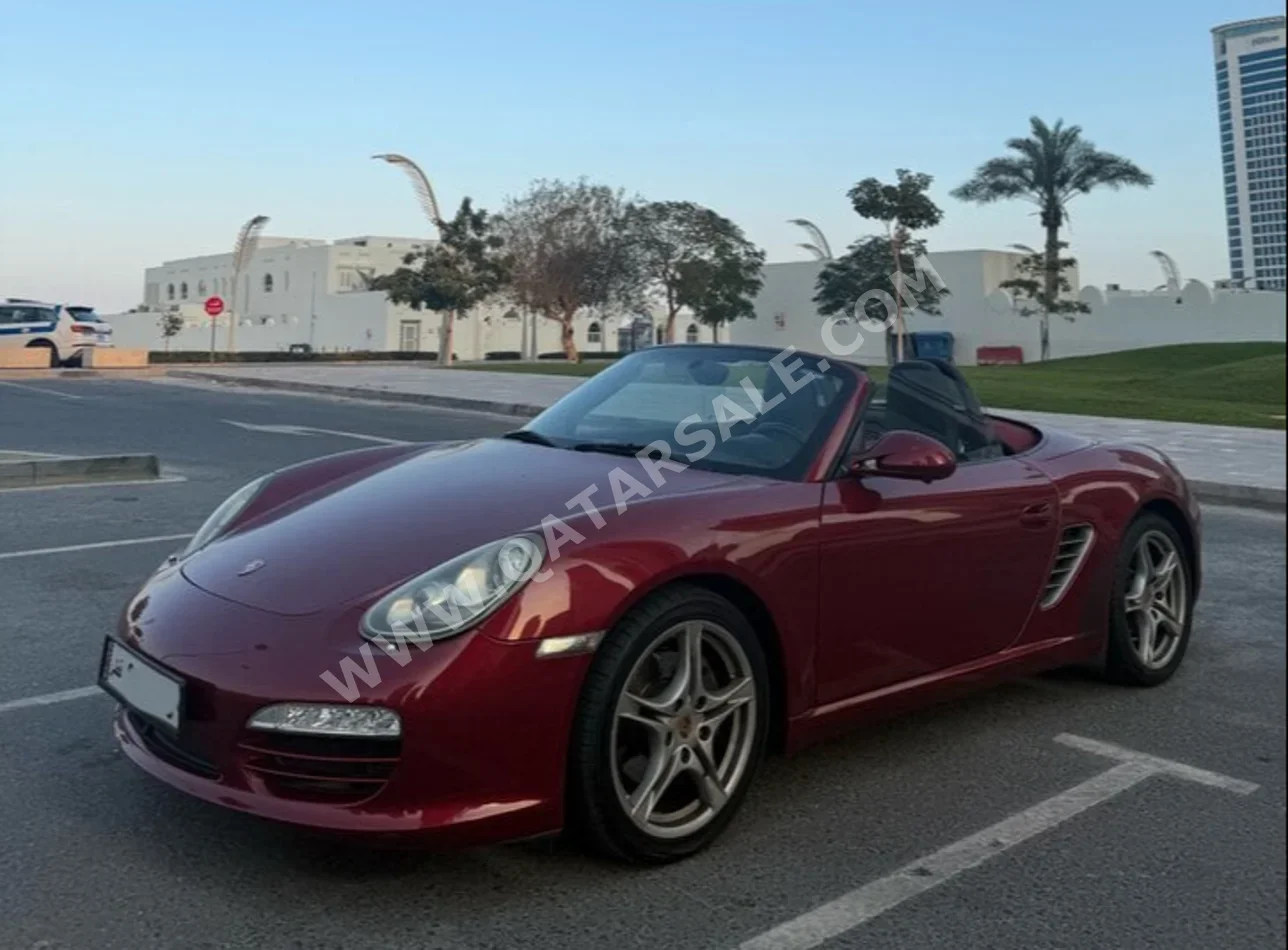 Porsche  Boxster  2010  Automatic  37,500 Km  6 Cylinder  Rear Wheel Drive (RWD)  Convertible  Maroon