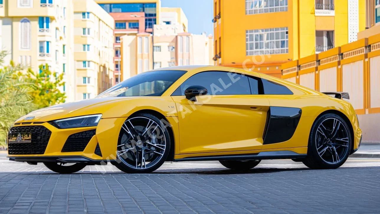 Audi  R8  V10  2023  Automatic  1,600 Km  10 Cylinder  Rear Wheel Drive (RWD)  Coupe / Sport  Yellow  With Warranty