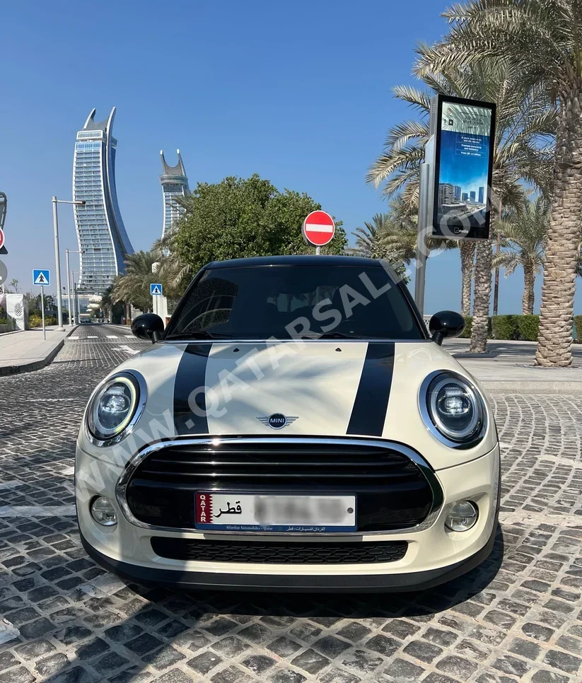 Mini  Cooper  2019  Automatic  44,000 Km  4 Cylinder  Front Wheel Drive (FWD)  Hatchback  White  With Warranty