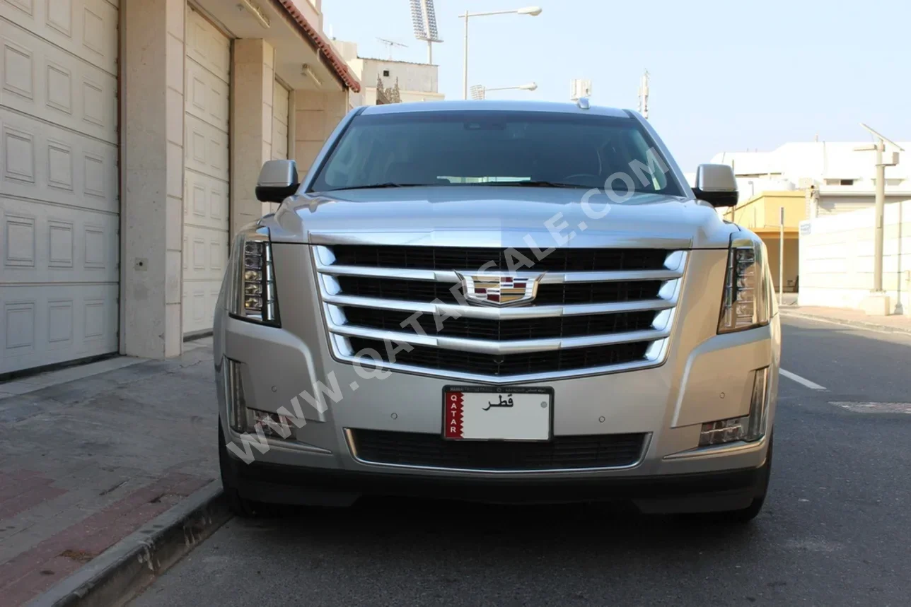 Cadillac  Escalade  2016  Automatic  53,000 Km  8 Cylinder  Four Wheel Drive (4WD)  SUV  Silver  With Warranty
