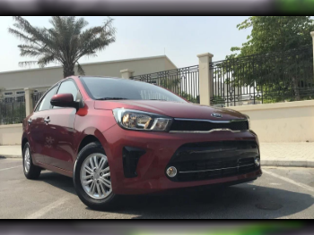 Kia  Pegas  4 Cylinder  Sedan  Red  2023