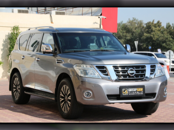 Nissan  Patrol  Platinum  2015  Automatic  178,000 Km  8 Cylinder  Four Wheel Drive (4WD)  SUV  Gray